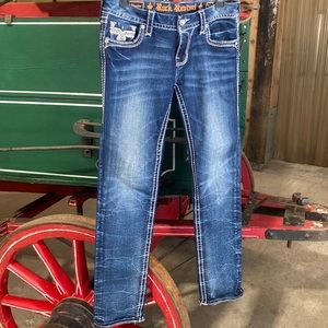 Rock revival women’s jeans. Diamond accent buttons. Dark denim